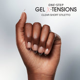 Close-up of a model's hand wearing Salon Perfect  305 Gel X-Tensions Clear Short Stilletto.